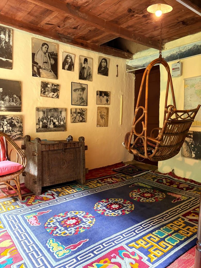A room filled with art and old photographs from the Andretta artists' colony