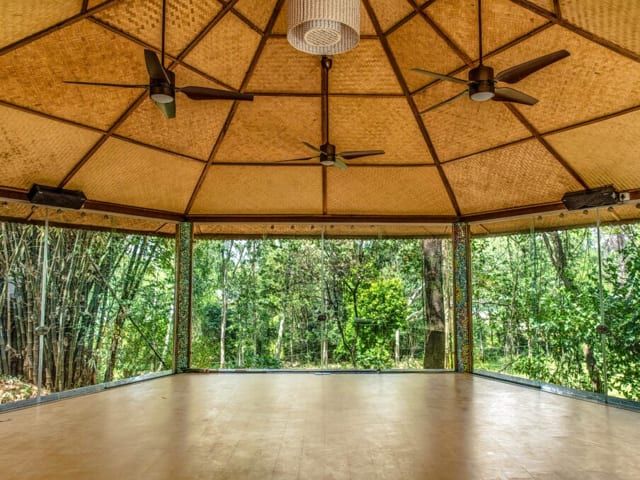 The open-sided yogashala in a bamboo grove